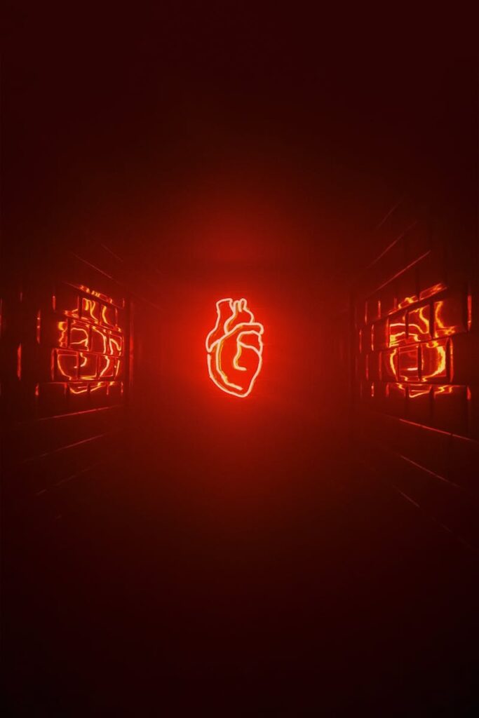 Neon heart shining in red